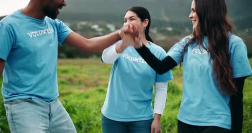 Volunteers Celebrating Success in Rural Natural Setting