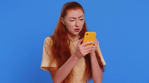 Young Woman Expressing Frustration While Using Phone