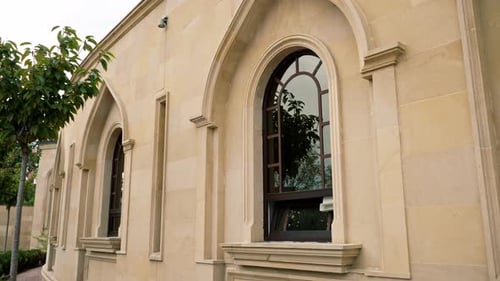 A beautiful cosy courtyard with large windows of Muslim mosque surrounded by Islamic ornaments