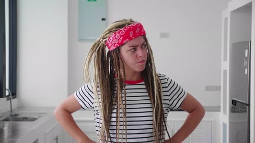Young Woman Expressing Anger and Frustration Indoors