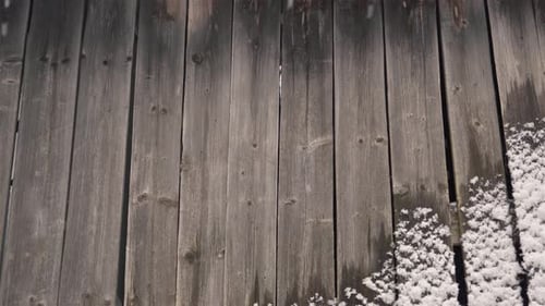 Winter Background of Old Wooden Wall Made of Gray Boards Planks with Snow