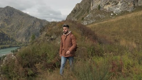 Hiker Tourist Traveler Man with Backpack at Mountains Outdoors River Hiking Travel Landscape Nature