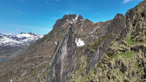 Svolvaergeita mountain peak in Lofoten with parallax view of surrounding mountains