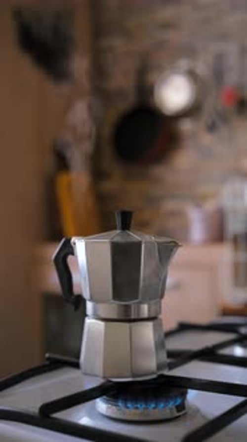 Coffee Pot Boiling On Gas Stove