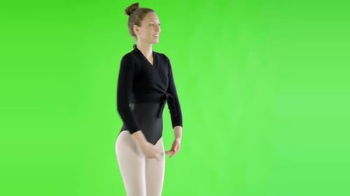 Woman dances in a leotard on a green screen