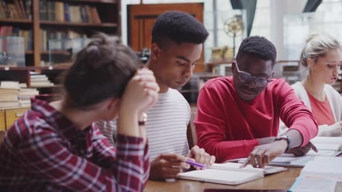 University students collaborate on project in library for education success