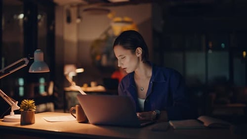 Woman Analyst Unmotivated Overtime Work Reading Papers in Night Office Closeup
