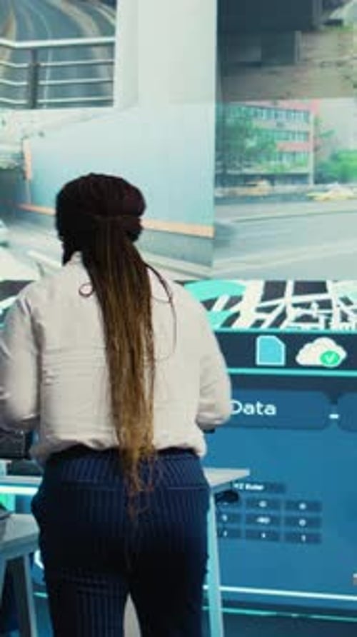 Vertical Video Team Leader Gives Order Tracking Details to Her Employees in Control Center