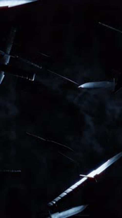 Sharp Knives Spinning and Falling Dark Cinematic Background