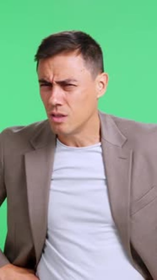 Sick Businessman Coughing on Green Screen Background