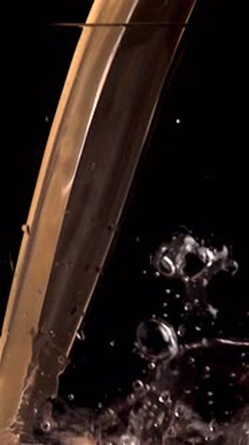 Experience Super Slow Motion Beverage Pouring Captured at 1000 Fps Showcasing the Beauty of Liquid