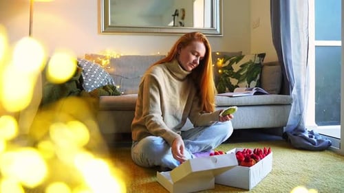 Woman with Desserts at Home in Natural Light