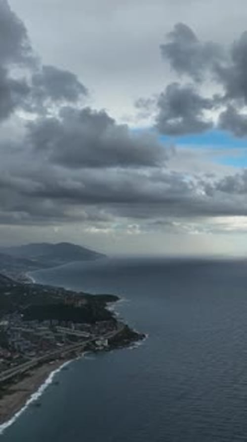 Vertical Video Captivating Aerial Perspective Stunning Coastal Sunset Over the Mediterranean