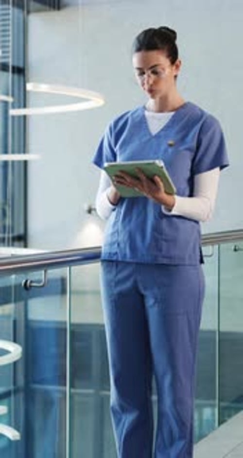 Thinking, doctor and woman with tablet, hospital and reading medical research with glasses