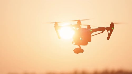 Shot of Modern Smart Drone Copter Aircraft Analyzing Scanning Agricultural Field Farming Landscape