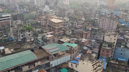 Panoramic view over Dhaka’s densely packed cityscape, shrouded in thick smog, Bangladesh