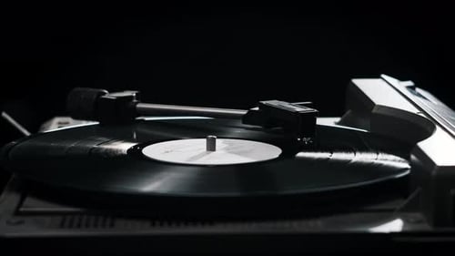 Vinyl Record Spinning on a Turntable Close Up