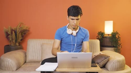The man who can't use the application on the laptop.