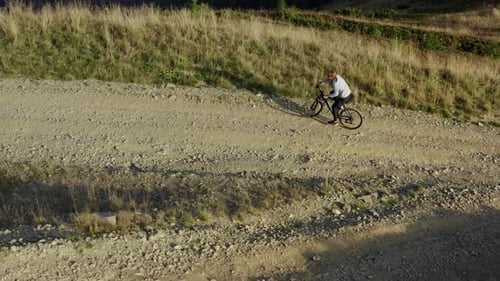 Mountain Bike Riding Drone View Rocky Grassy Path Warm Sunny Summer Day Vacation. Tranquil Scene ...