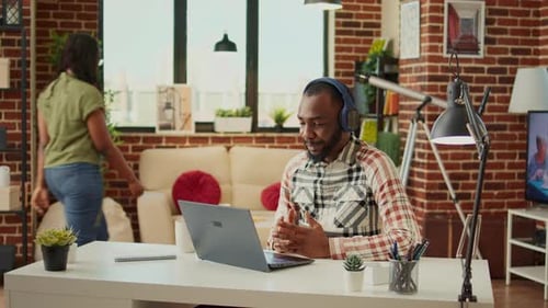 Businessman Attending Online Videoconference Meeting