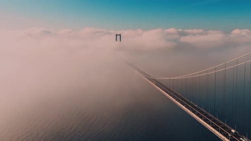 a bridge under foggy
