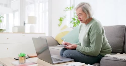 Laptop, writing and documents for finance with an old woman in the living room for retirement