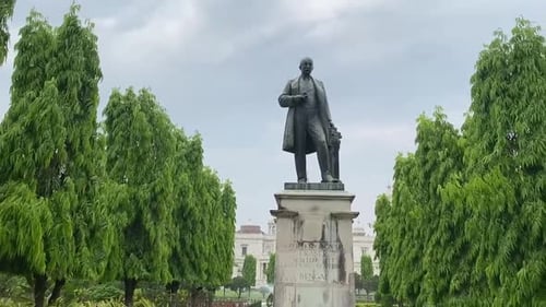 Pan shot of statue of Sir Andrew Leith Fraser, Governor West Bengal, inside Victoria Memorial in Kol
