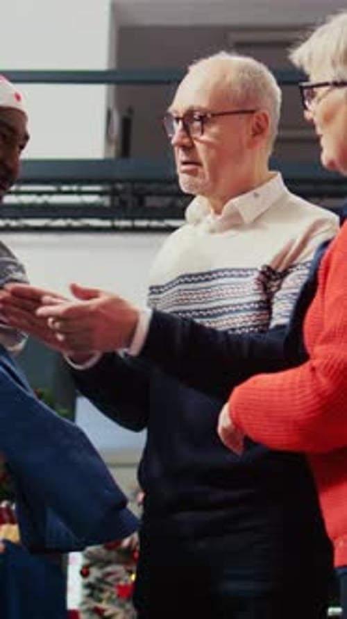 Vertical Video Elderly Couple in Xmas Fashion Shop