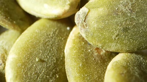 Intricate macro view of pumpkin kernels.