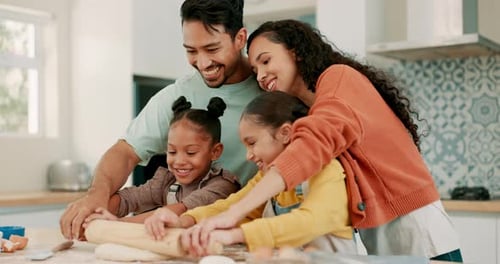 Happy Family Baking Together in Bright Kitchen