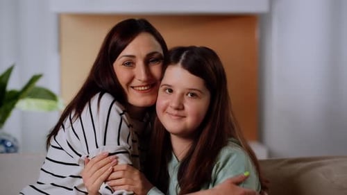 Loving Mother and Child Embrace in Home