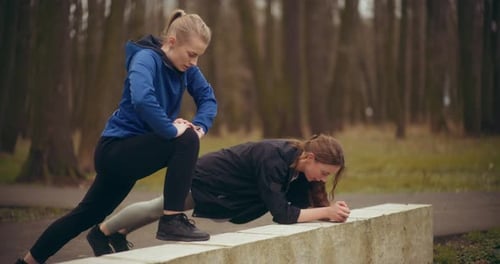 Two Woman Workout Exercising In Park Jogging Fitness