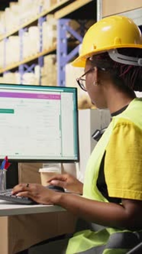 Vertical Video Ecommerce Worker Scanning Awb Tags on Cargo Pallets for System Registration