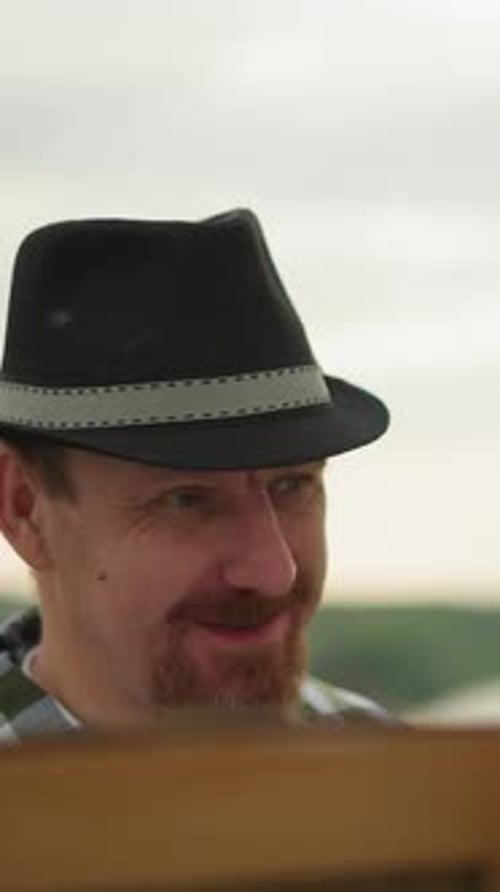 Artist Painting Outdoors with an Organic Element