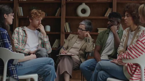 Diverse Adults in a Group Therapy Session