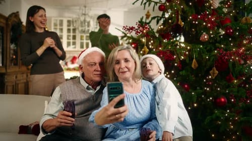 Family Celebrating Christmas and Taking a Selfie