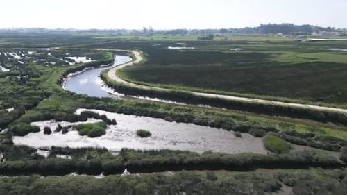 Curving tributary of Aveiro Ria in Veiros, Estarreja, Portugal - aerial