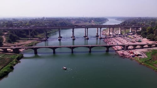 agriculture land with Tilwara Narmada River Bridge and flying birds at Jotpur, Jabalpur, Madhya Prad