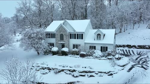 Snow Covered Home in a Winter Landscape