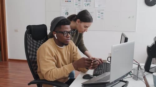 Co-workers Solving Problem With Cybersecurity