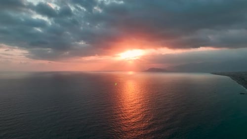 Aerial View Fiery Sunset Reflecting on the Tranquil Mediterranean Sea