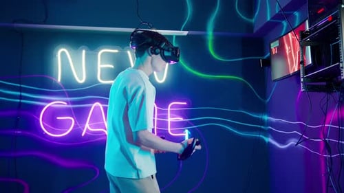 Man Playing New Virtual Reality Game with Headset