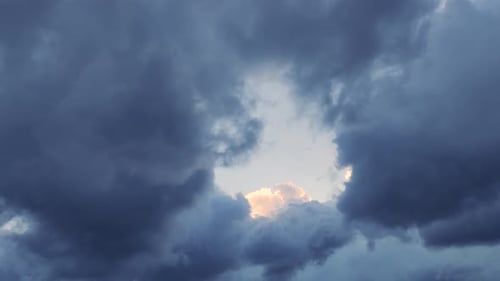 Cloudy sky with sunlight shine through