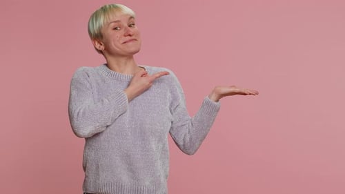 Woman Pointing Empty Place Advertising Area for Commercial Text Copy Space for Goods Promotion