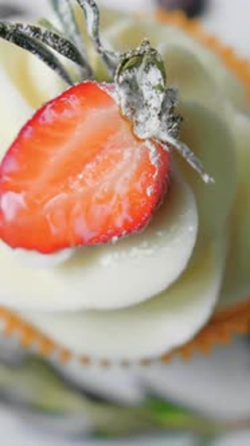 Cupcake with Strawberry and Rosemary Close Up