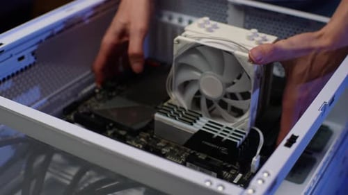 Gamer Male Installing New Graphics Card of Latest Model on Motherboard Stages of Upgrading or