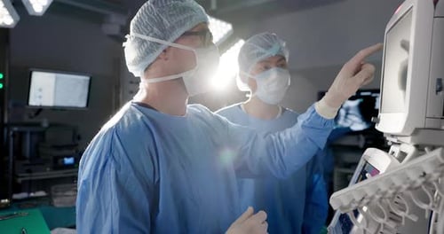 Doctors, digital machine or heart monitor in theater, hospital or operation room for surgery