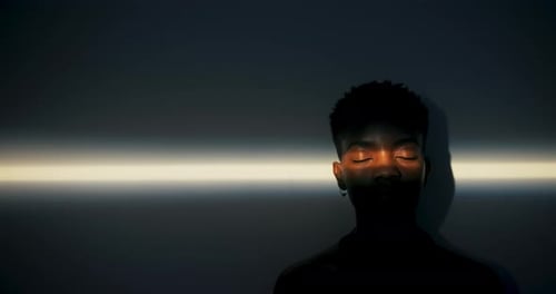 Stylish Person Silhouetted with Horizontal Light Across Face