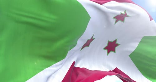Realistic Burundi Flag Waving Against Blue Sky