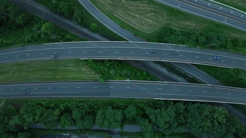 Few Vehicles Driving On The Highway In Massachusetts At Blue Hour. - aerial shot
